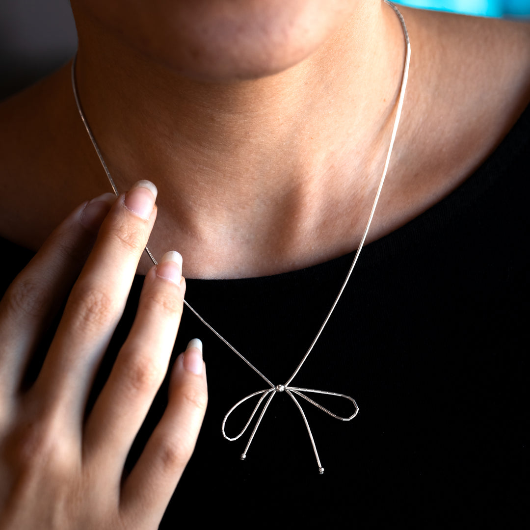 Bead Maiden: Liquid Silver Bow Necklace