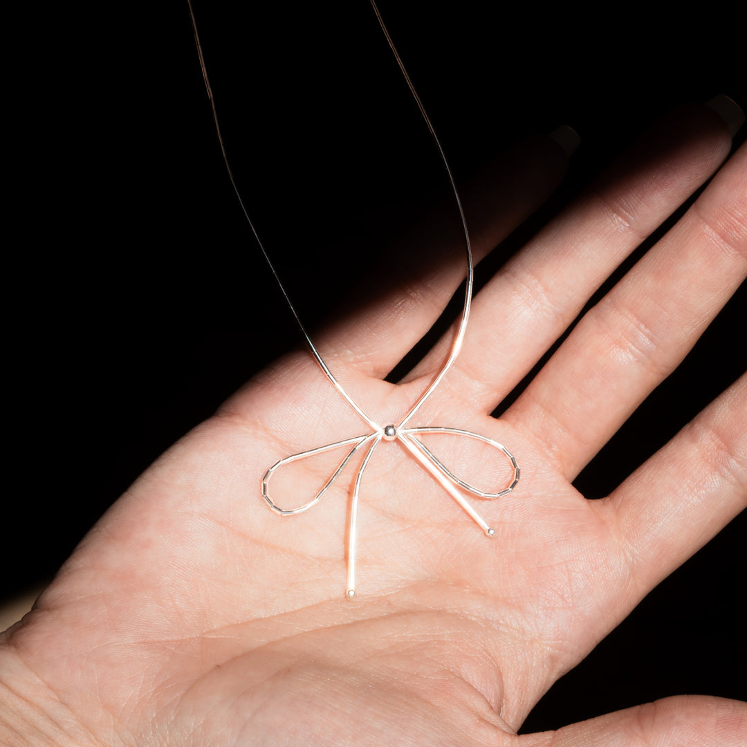 Bead Maiden: Liquid Silver Bow Necklace