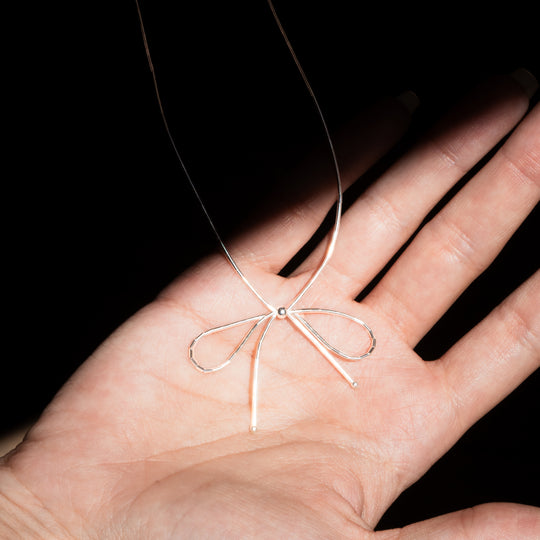 Bead Maiden: Liquid Silver Bow Necklace