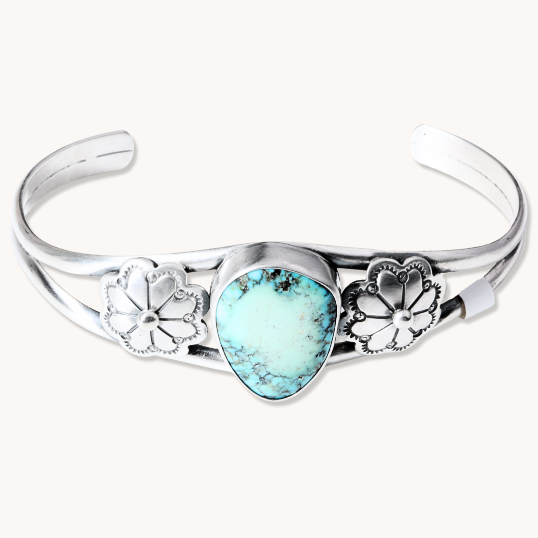 Turquoise Bracelet with Silver Flower Accents