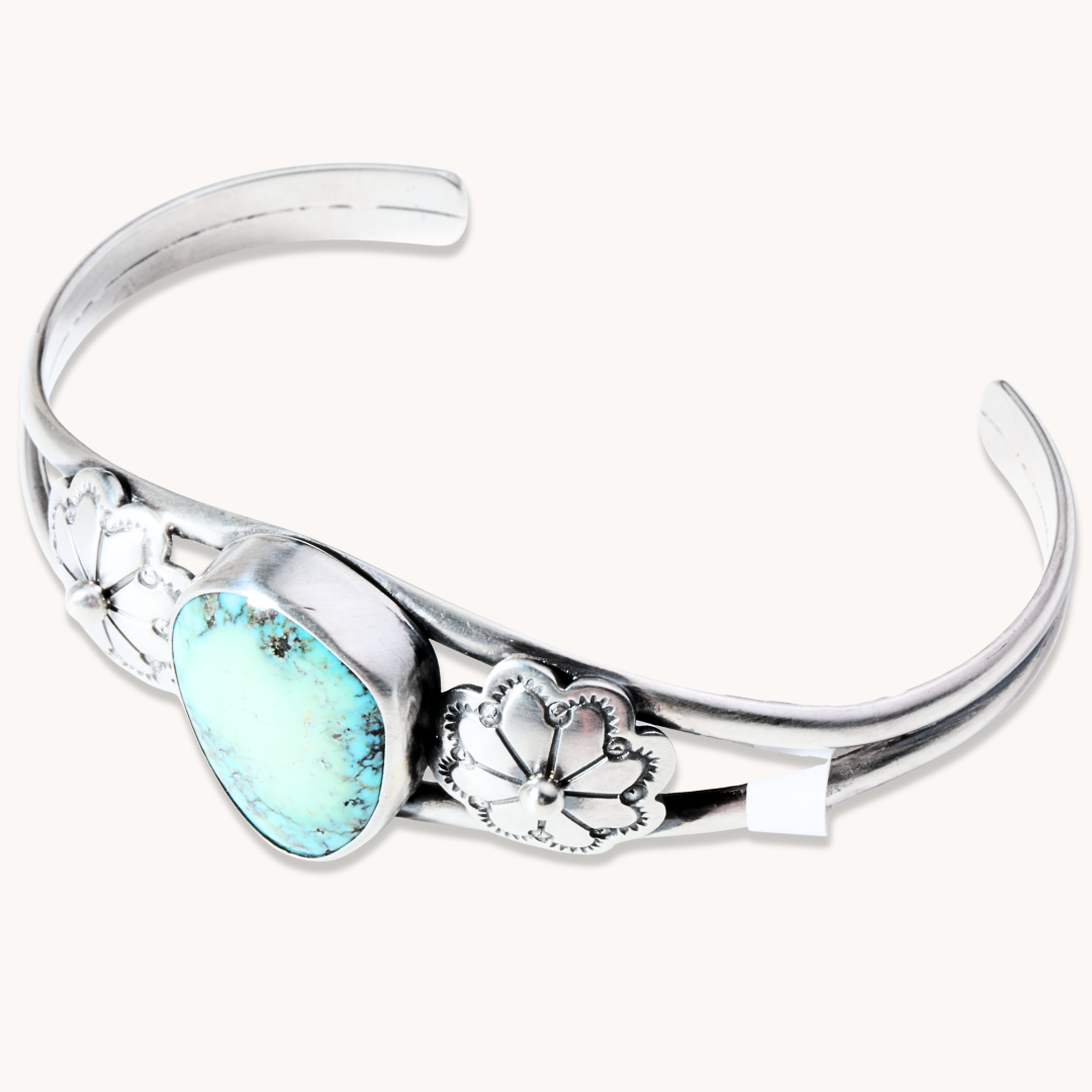 Turquoise Bracelet with Silver Flower Accents
