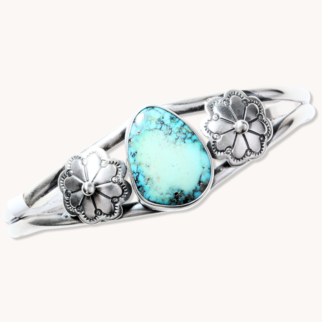 Turquoise Bracelet with Silver Flower Accents