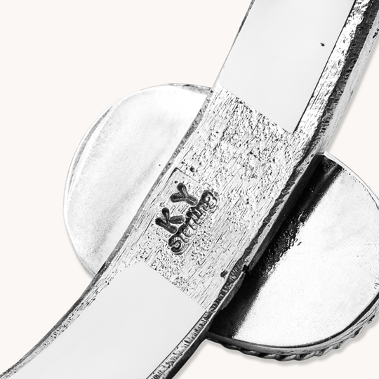 Cast Sterling Silver Bracelet with Turquoise Centerpiece
