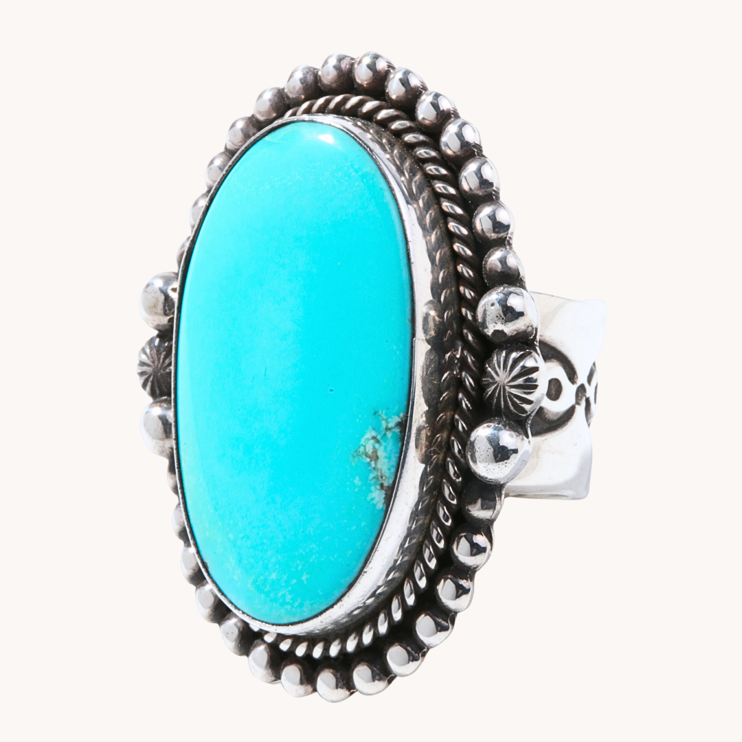 Turquoise Ring with Silver Bead Border