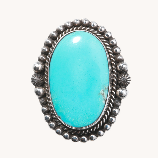 Turquoise Ring with Silver Bead Border