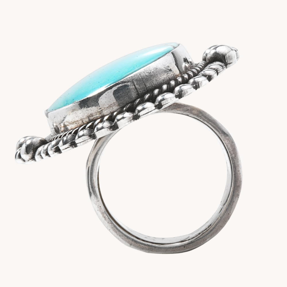 Turquoise Ring with Silver Bead Border