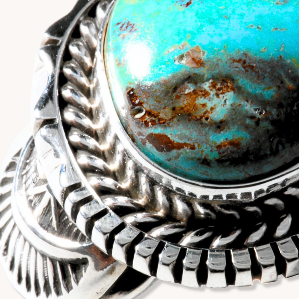 Turquoise Ring with Saw-Work Border
