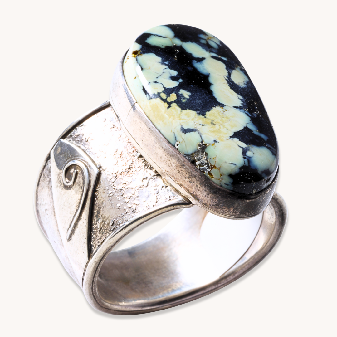 Wide-Band Variscite Ring in sterling silver featuring a large, polished variscite stone with black and green patterns.