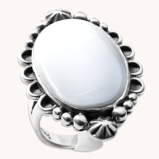 T.Skies Mother of Pearl Ring with silver bead accents, featuring an oval white stone set in detailed sterling silver.