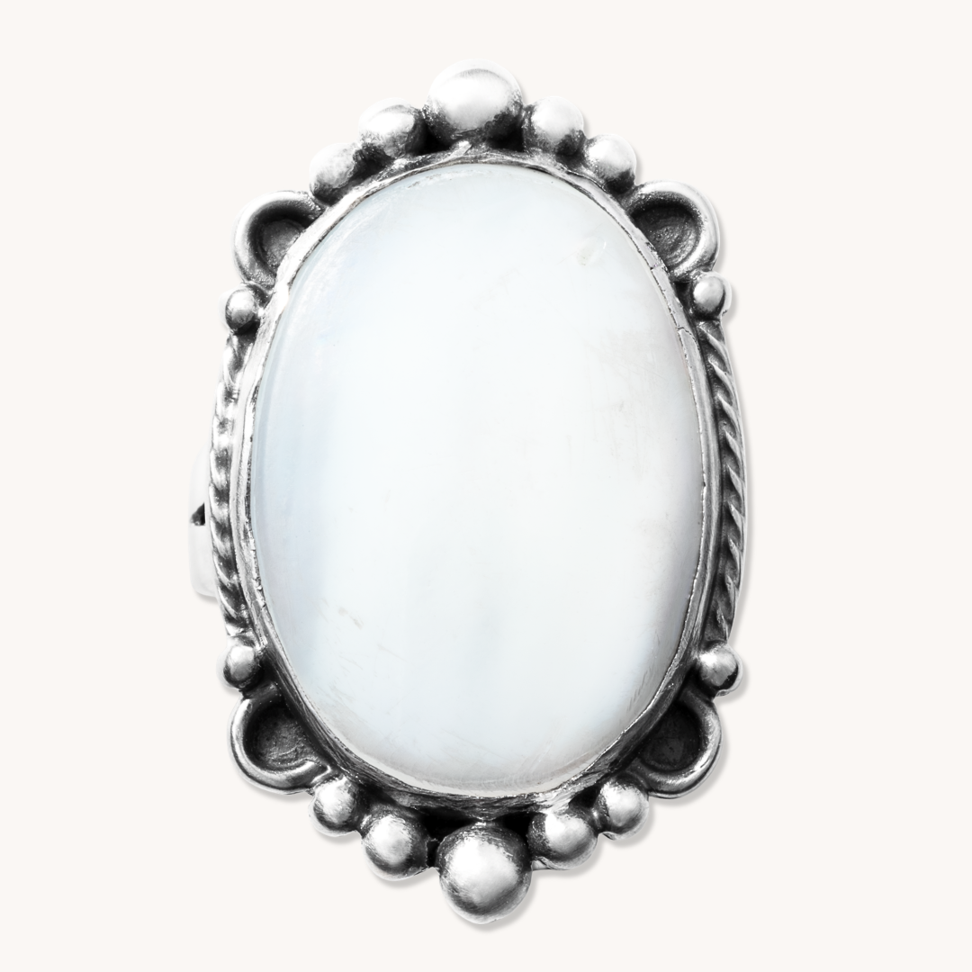 T.Skies Mother of Pearl Ring with Silver Bead Accents, featuring an oval white stone set in sterling silver.
