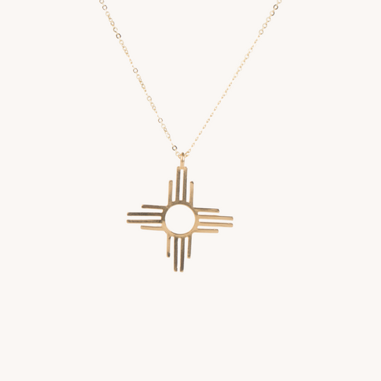 Enchantment: Zia Dangle Jewelry Set, sterling silver necklace featuring a Zia symbol pendant.