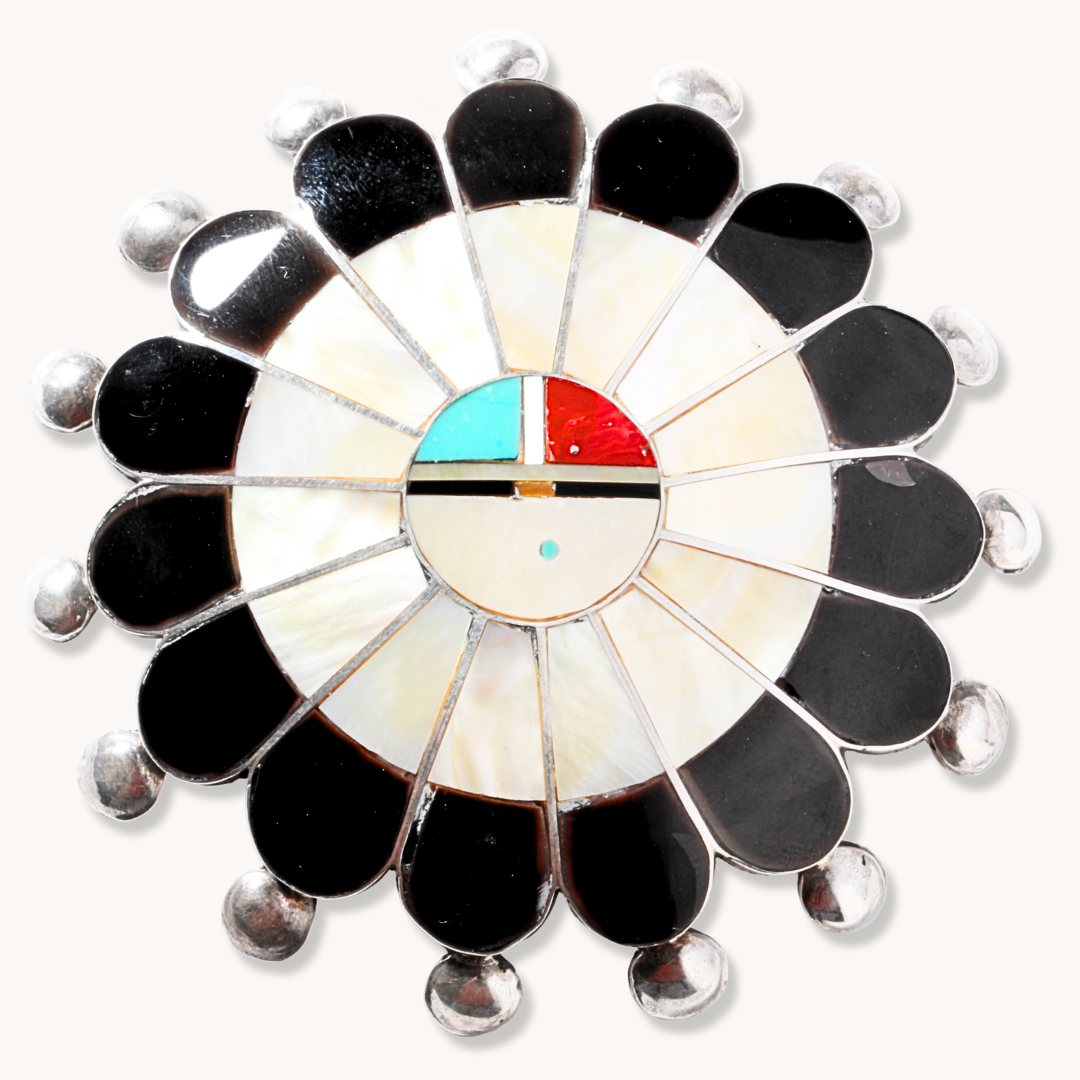 Zuni Sunface Pendant with Brooch Pin, crafted from sterling silver and featuring colorful inlay designs.