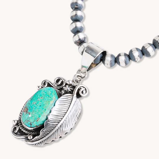 Turquoise Pendant with Feather Applique