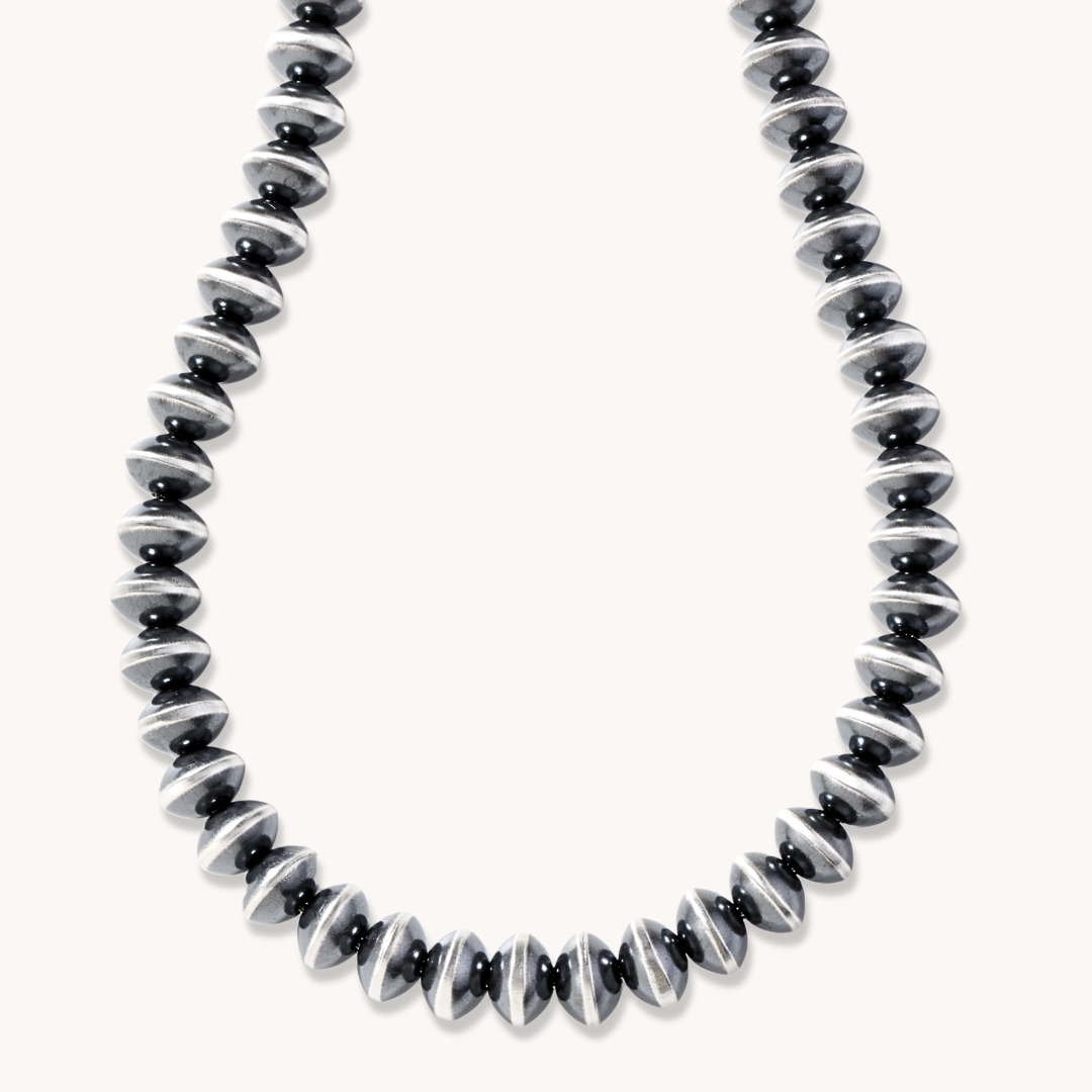 Handcrafted Navajo Pearls Necklace by T.Skies, made of sterling silver with a polished finish.