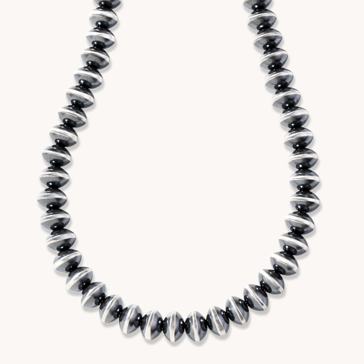 Handcrafted Navajo Pearls Necklace by T.Skies, made of sterling silver with a polished finish.