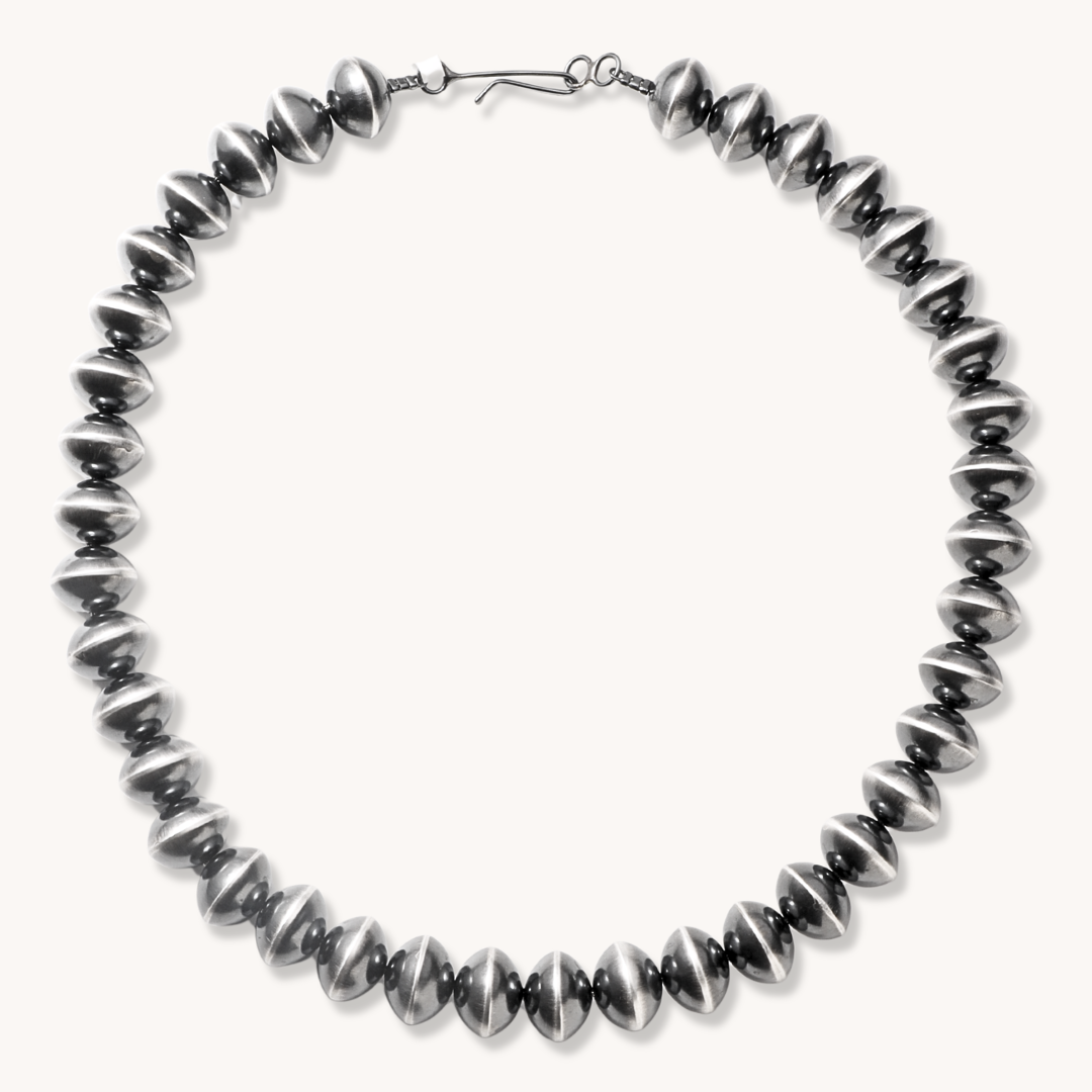Statement Navajo Pearls Beads Necklace made of sterling silver, featuring a series of polished, oval-shaped beads.