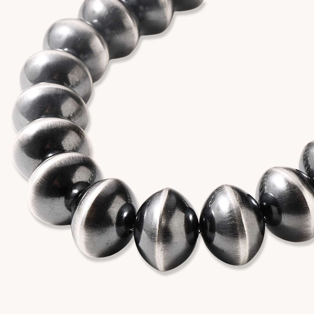 Statement Navajo Pearls Beads Necklace made of sterling silver, featuring a unique design with alternating bead shapes.