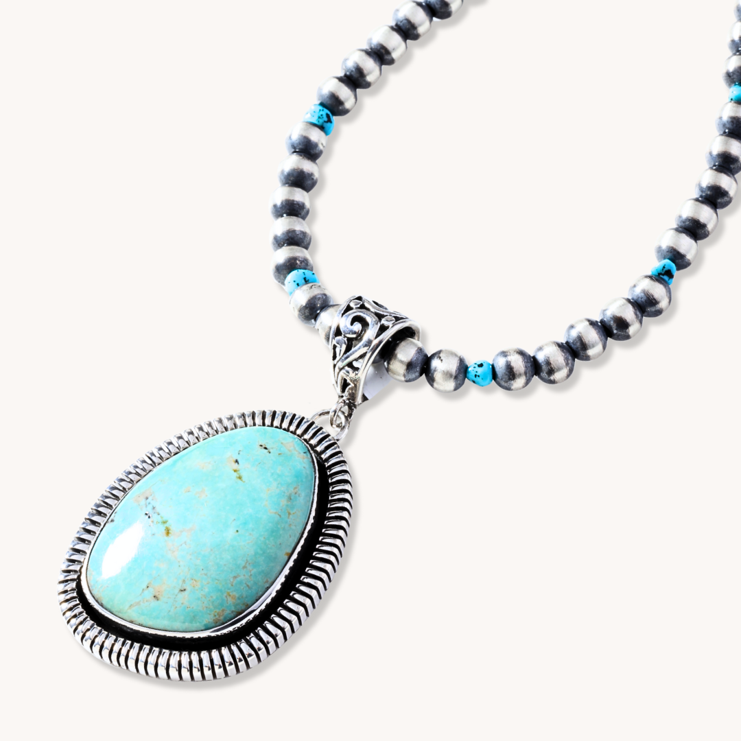 Turquoise Pendant with Saw-Work Border