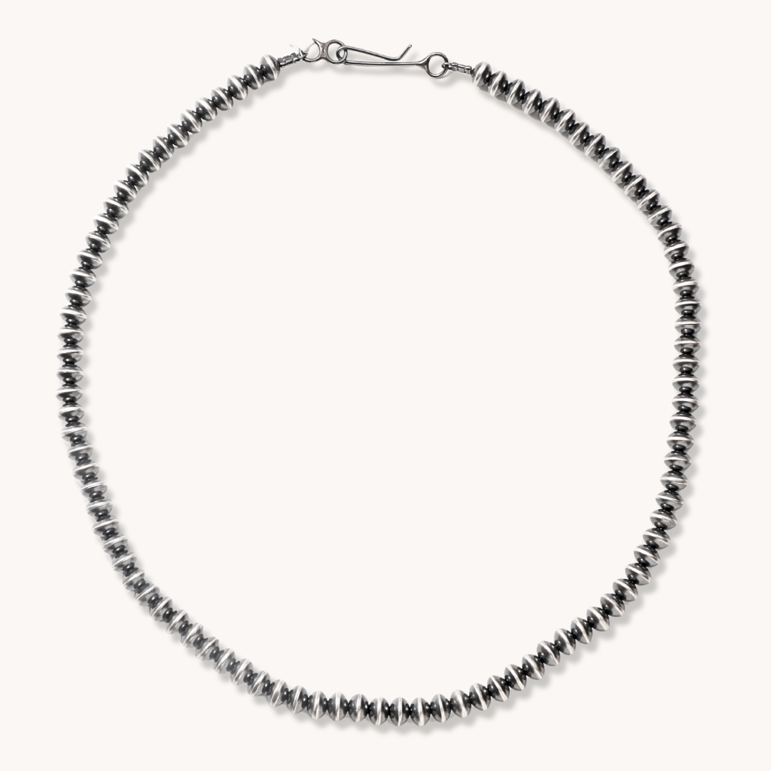T.Skies Sterling Silver Navajo Pearls Necklace featuring a series of polished, round silver beads.