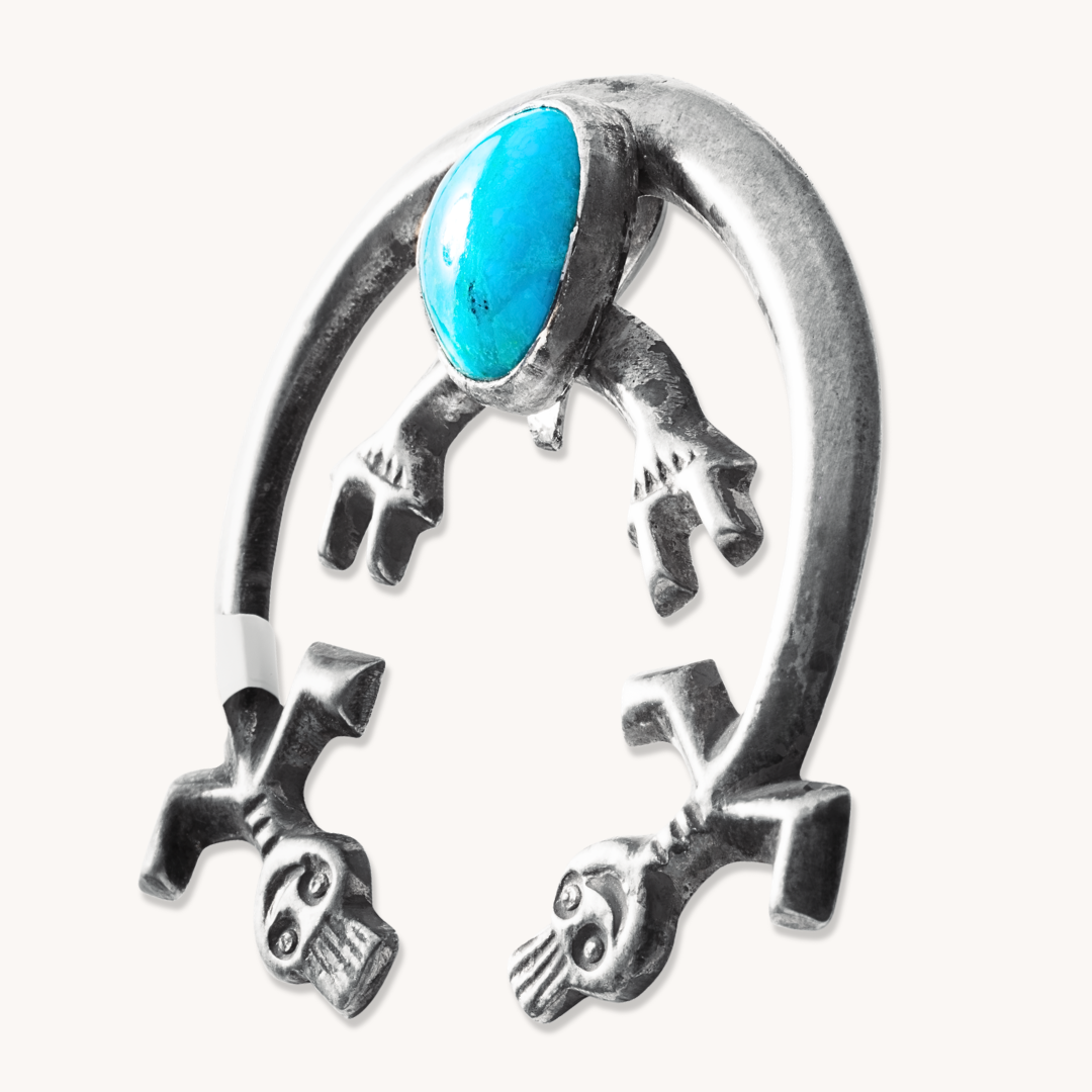 Vintage Turquoise Rainbow Man Pendant, sterling silver, featuring a turquoise stone and intricate design.