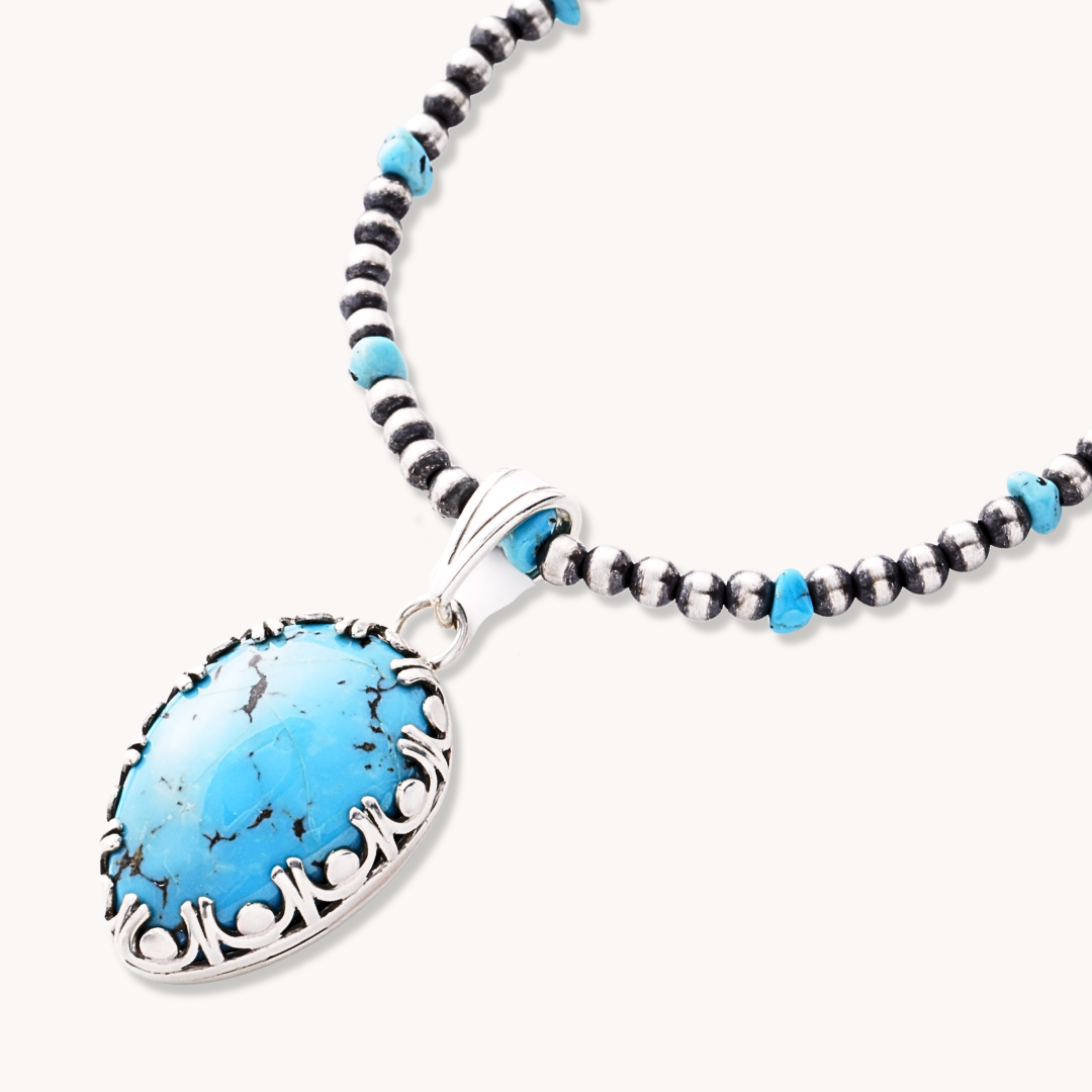 Turquoise Pendant with Pawprint Cutout