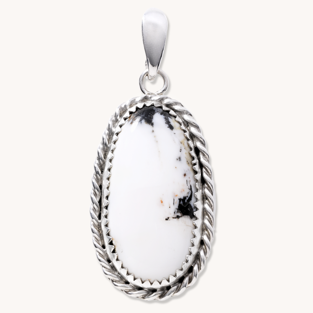 Navajo-Made White Buffalo Pendant with Twist Wire Border