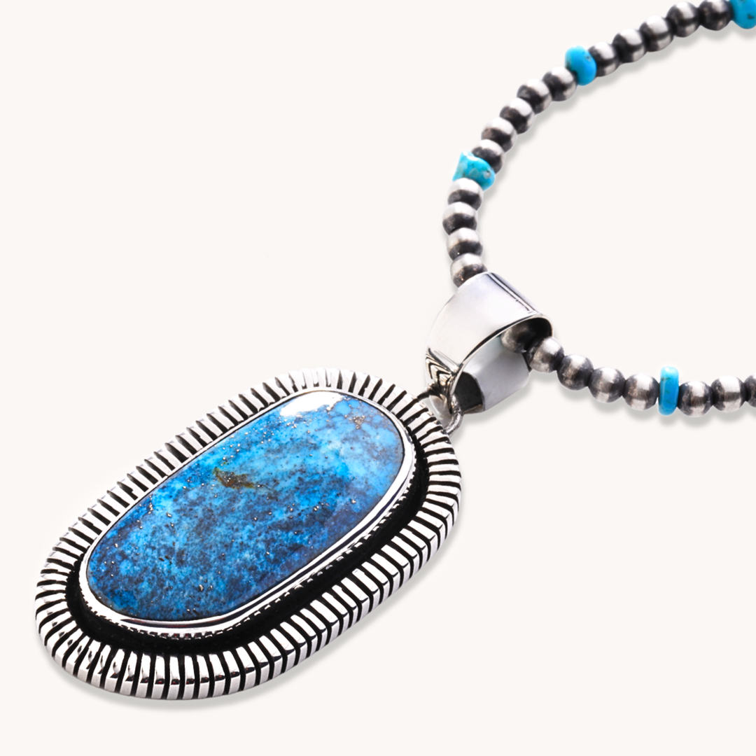 Turquoise Pendants with Saw-Work Border