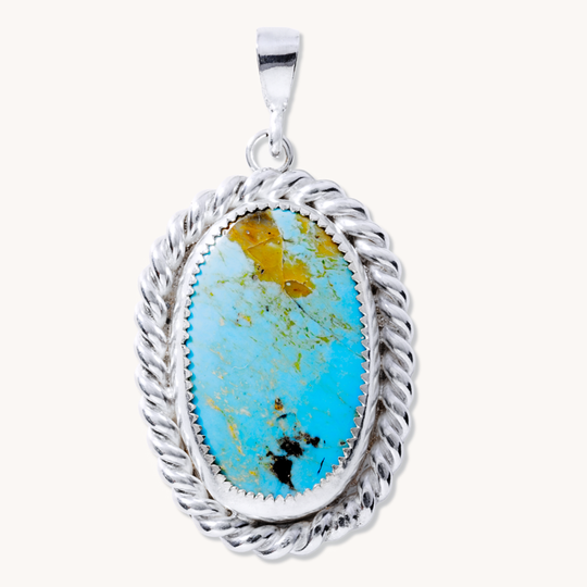 Turquoise Pendant with Twist Wire Border and Feather Cutout