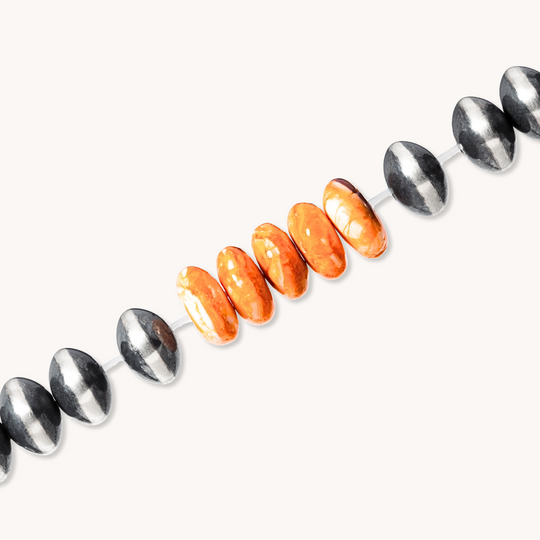 Bead Maiden: Spiny Oyster Stretch Bracelets featuring vibrant spiny oyster beads and polished sterling silver accents.