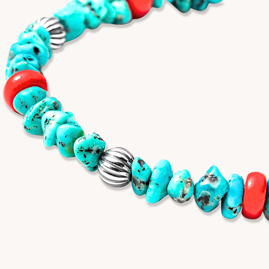 Bead Maiden: Desert Rain Turquoise and Coral Bracelet featuring turquoise stones, coral beads, and sterling silver accents.
