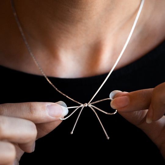 Bead Maiden: Liquid Silver Bow Necklace