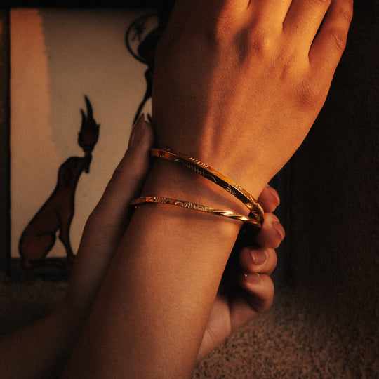 Stamp Dancer: Sage Sisters Bracelet Set, sterling silver bracelets worn on a wrist, featuring intricate designs.