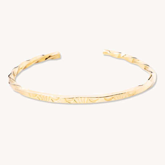 Stamp Dancer: Sage Twist Stacker Bracelet in sterling silver with a twisted design and engraved patterns.