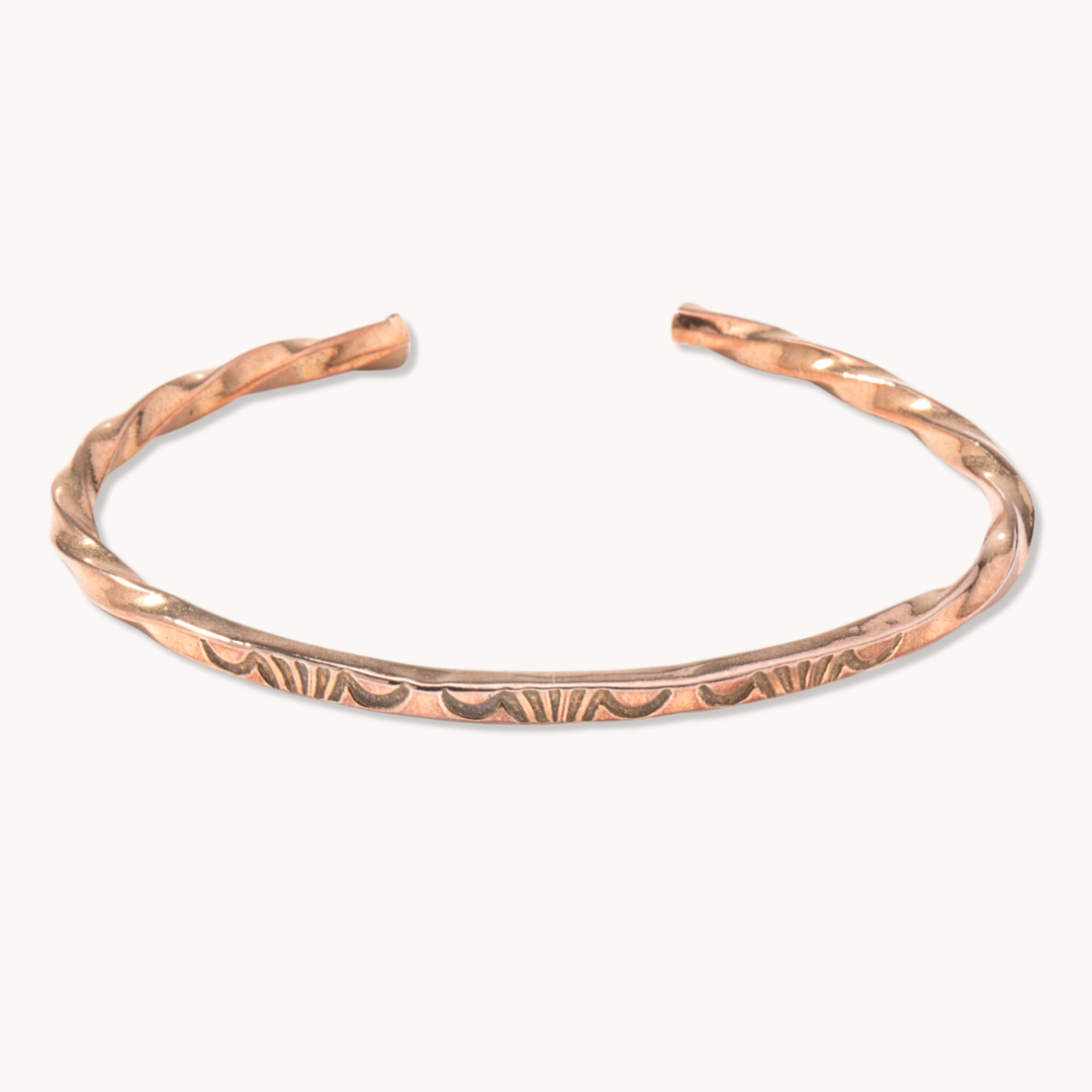 Stamp Dancer: Sage Twist Stacker Bracelet made of sterling silver, featuring a twisted design with intricate patterns.