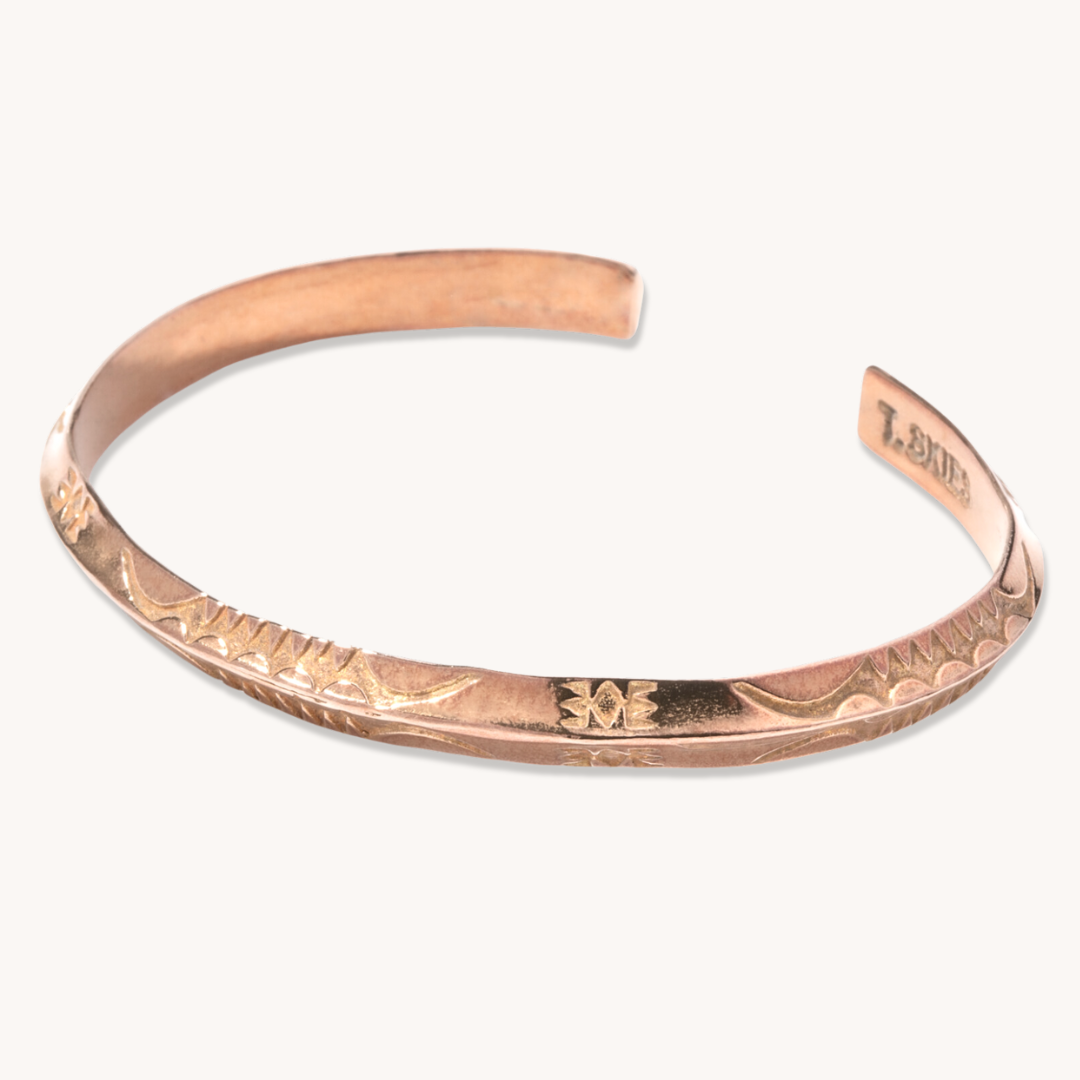 Stamp Dancer: Sagebrush Stacker Bracelet, handcrafted sterling silver with intricate floral designs.