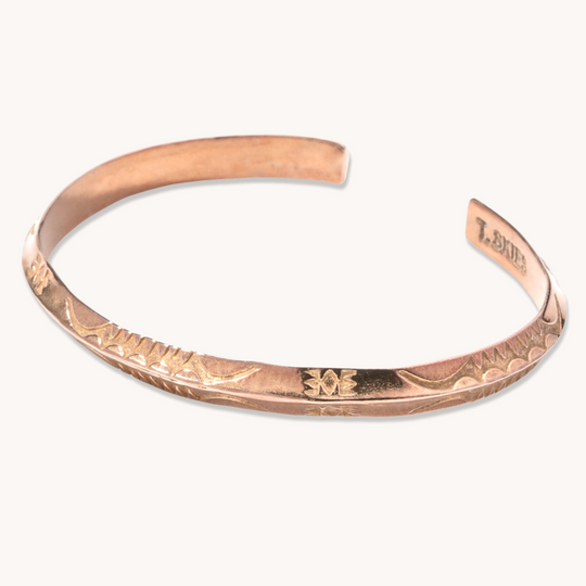 Stamp Dancer: Sagebrush Stacker Bracelet, handcrafted sterling silver with intricate floral designs.