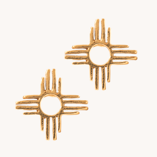 Enchantment Mini Zia Stud Earrings in sterling silver, featuring a sun symbol design with textured detailing.