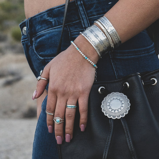 Turquoise Starshine Bracelet Paired with Stamp Dancer Cuff Bracelets by TSkies