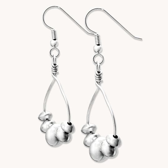 Desert Blossom: Lotus Flower Earrings, handcrafted sterling silver earrings with a unique floral design.