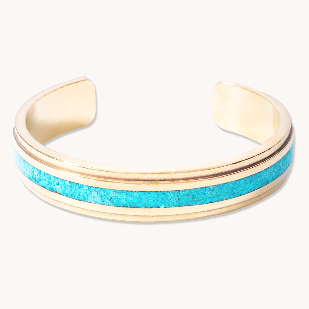 Radiante: Turquoise Vista Bracelet, a sterling silver cuff featuring a vibrant turquoise inlay.