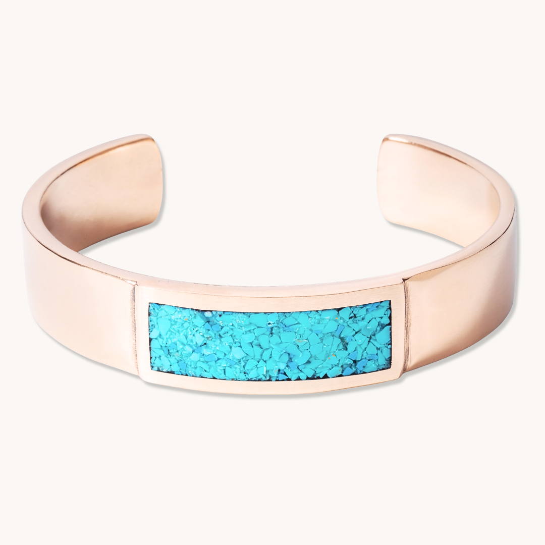 Radiante: Turquoise Ravine Bracelet, a sterling silver cuff featuring a vibrant turquoise inlay.