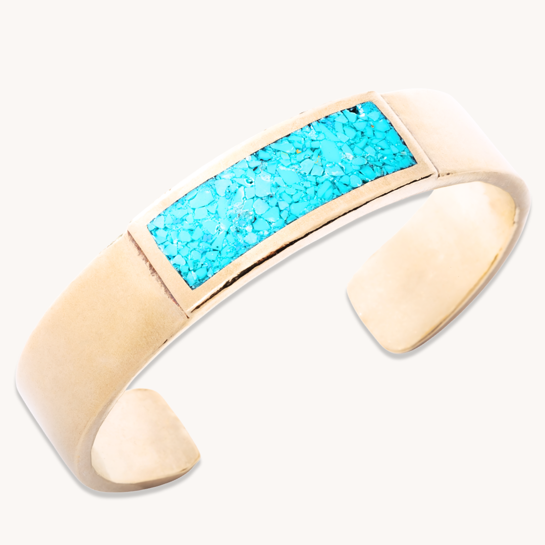 Radiante: Turquoise Ravine Bracelet, sterling silver with a vibrant turquoise inlay, showcasing Native American-inspired design.