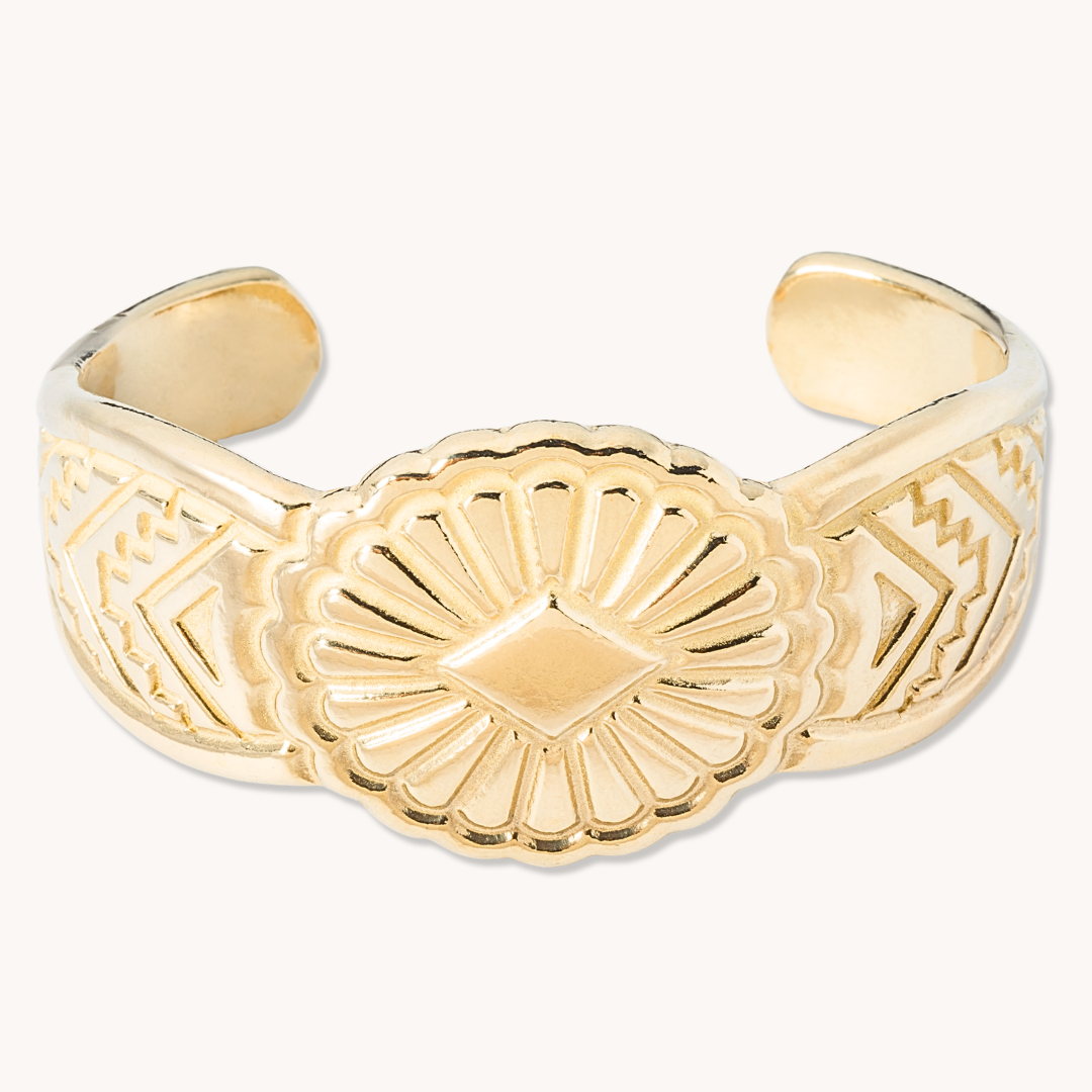 SkyWeaver: Saltillo Cuff Bracelet made of sterling silver, featuring intricate geometric patterns and a central diamond motif.