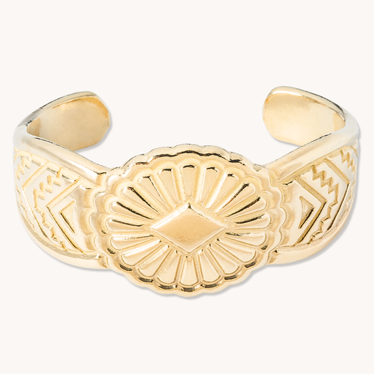 SkyWeaver: Saltillo Cuff Bracelet made of sterling silver, featuring intricate geometric patterns and a central diamond motif.