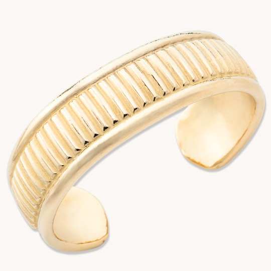 SkyWeaver: Weft Weave Cuff Bracelet in sterling silver, featuring a textured design with vertical grooves.