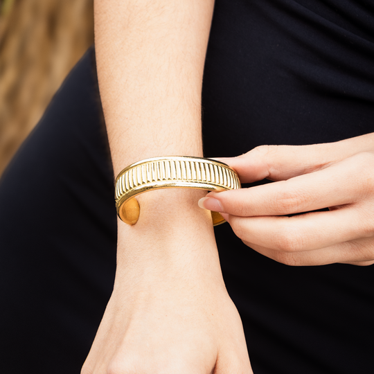SkyWeaver: Weft Weave Cuff Bracelet in sterling silver, featuring a textured design and a unique shape.