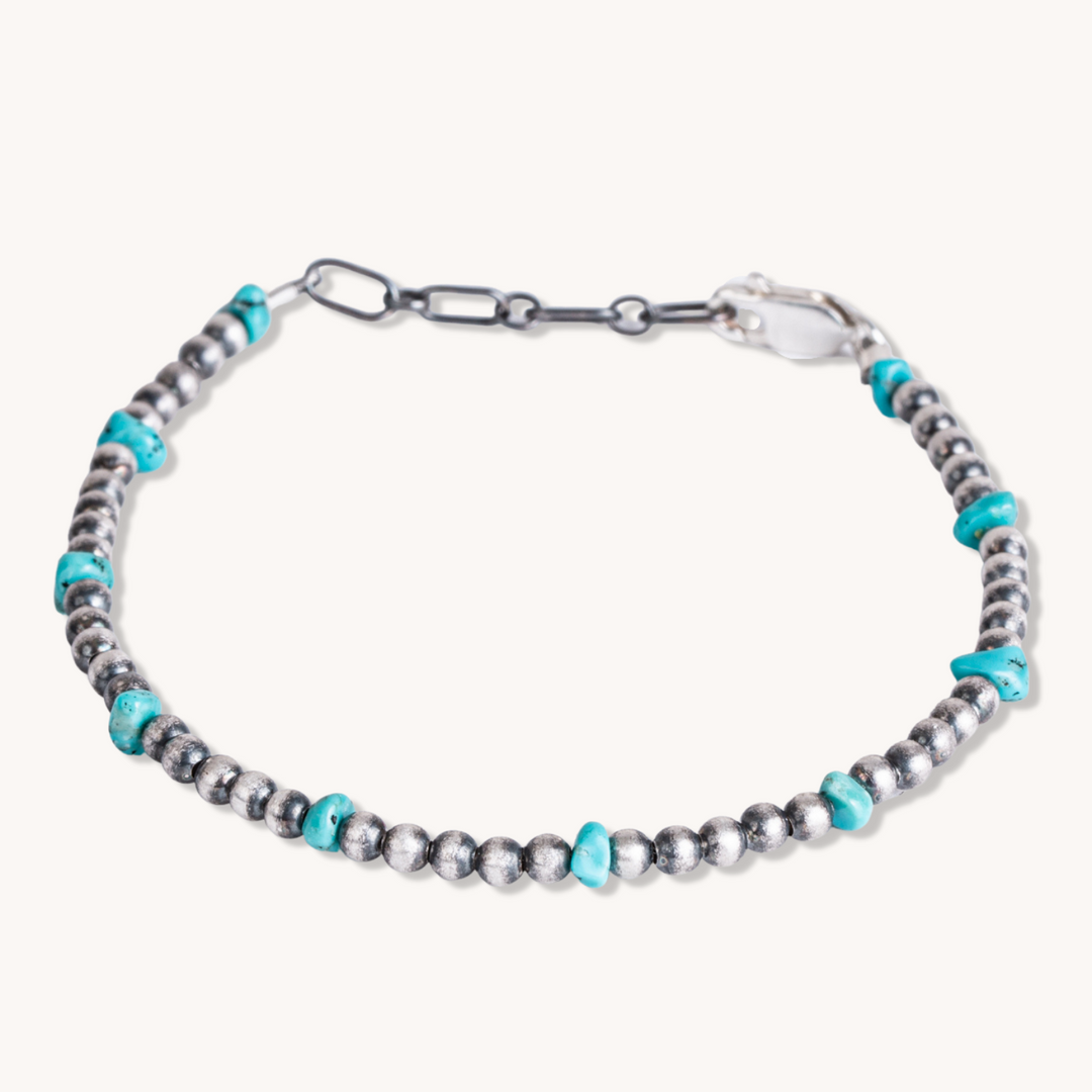 Handmade Silver Pearls Bracelet with Turquoise Beads by Tskies