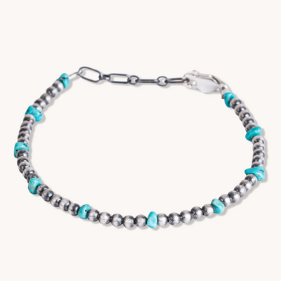 Handmade Silver Pearls Bracelet with Turquoise Beads by Tskies